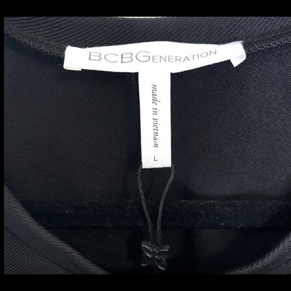 BCBG PEARLESCENT PUFF SLEEVE SHORT SLEEVE TOP - Picture 13 of 13